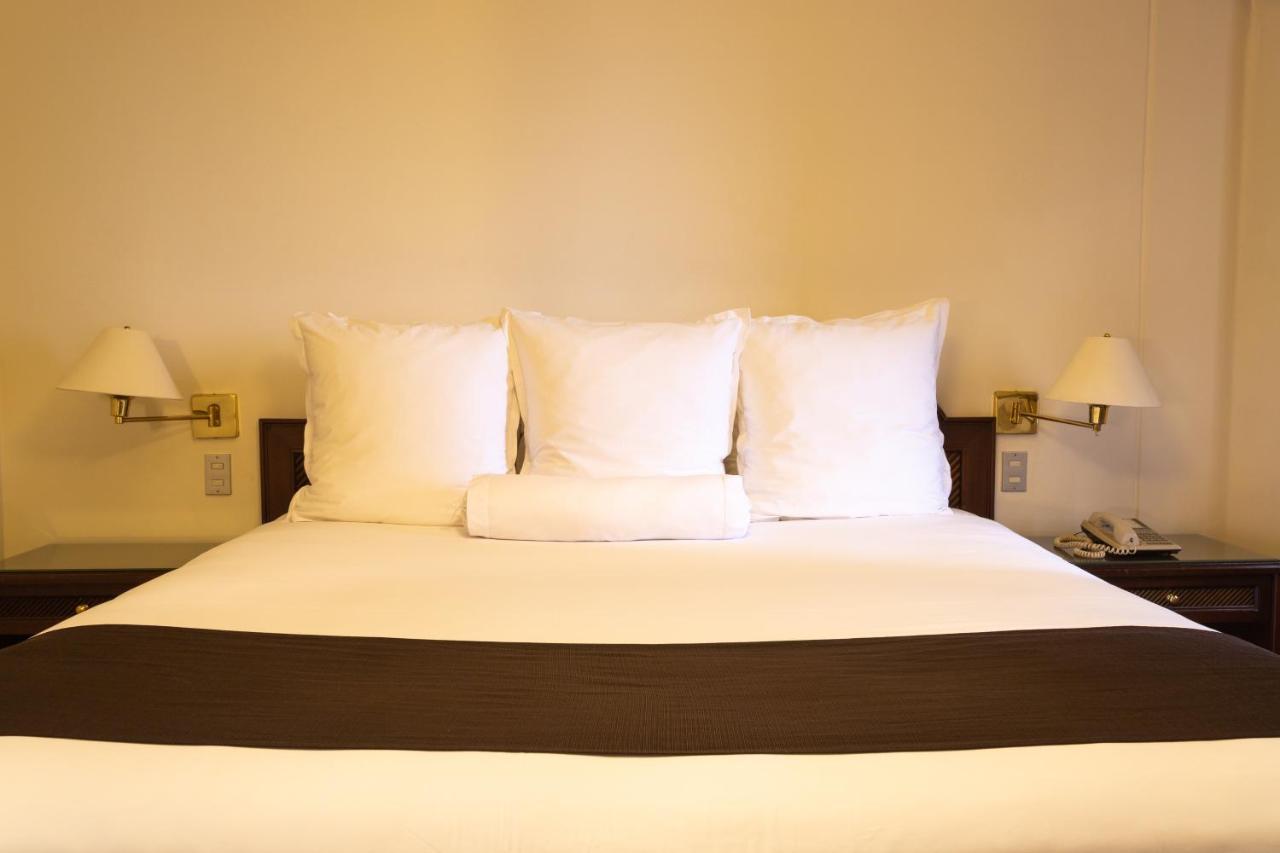 J&A Classic Hotel Ліма Екстер'єр фото A bed